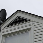 Raccoons enter and bend the louvres of gable vents