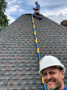 Chad and Tim using specialized roof access equipment