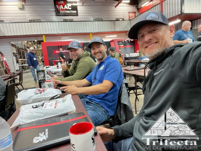 Team Trifecta Wildlife at AACD Momentum Conference 2023 Tim, Chad, and Rob of Team Trifecta attending Momentum Conference