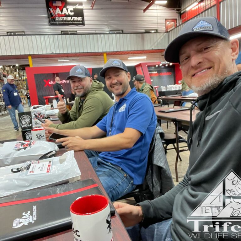 Team Trifecta Wildlife at AACD Momentum Conference 2023 Tim, Chad, and Rob of Team Trifecta attending Momentum Conference